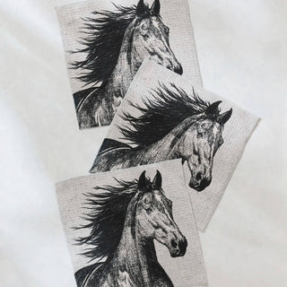 Three Geometry dishclotes with horse designs on a white background