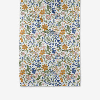 Floral patterned towel with colorful flowers on a white background